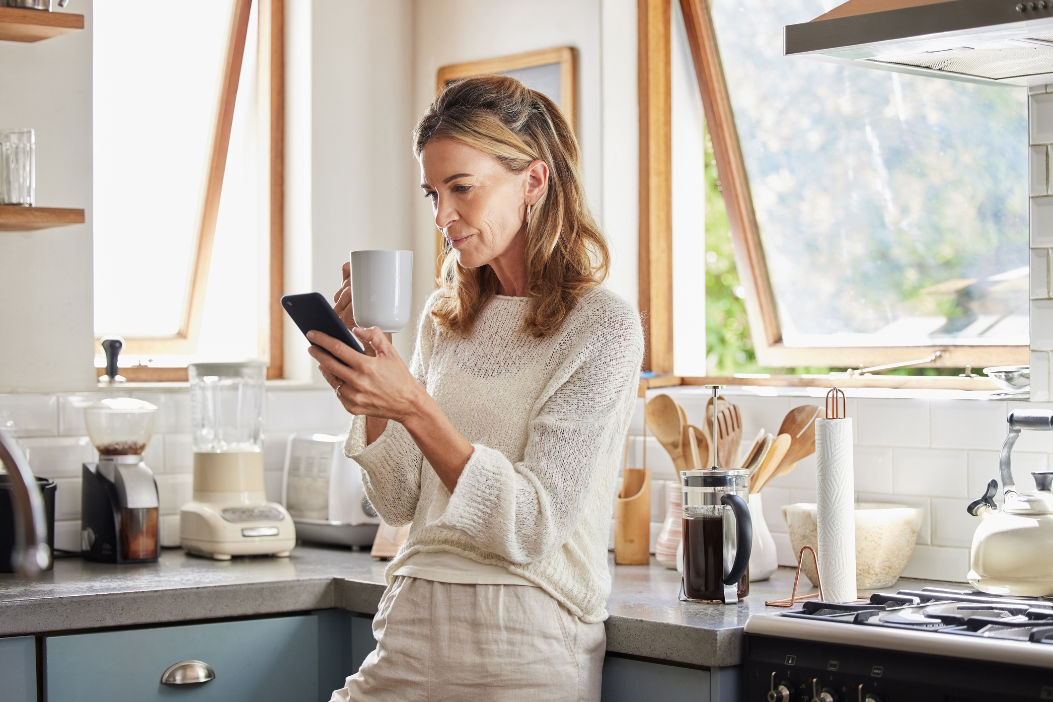 Woman on her phone in her remote home